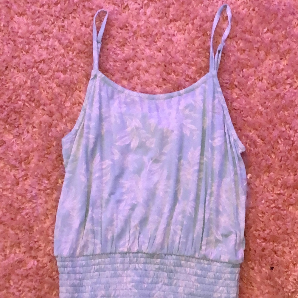Summery cyan colored tank top.
